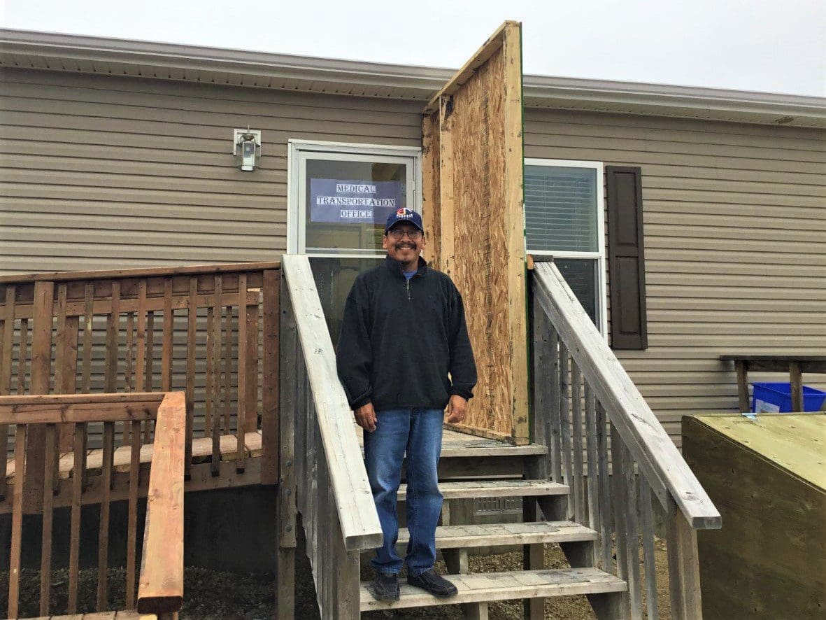 Sagkeeng first nation medical transportation coordinator standing outside his office