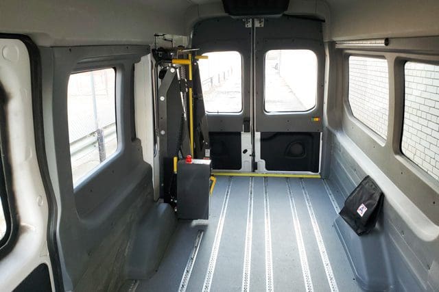 Passenger space for wheelchairs and seats in Ford Transit T6 paratransit van