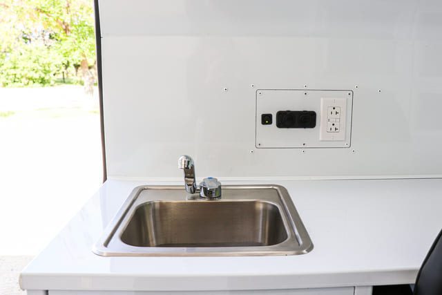 Sink and power outlets inside Mobile Medical Clinic Van