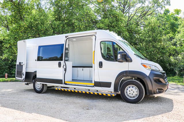 Mobile medical van with doors open.