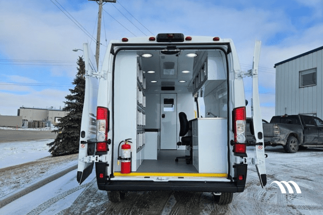 White Mobile Clinic Van with rear doors open