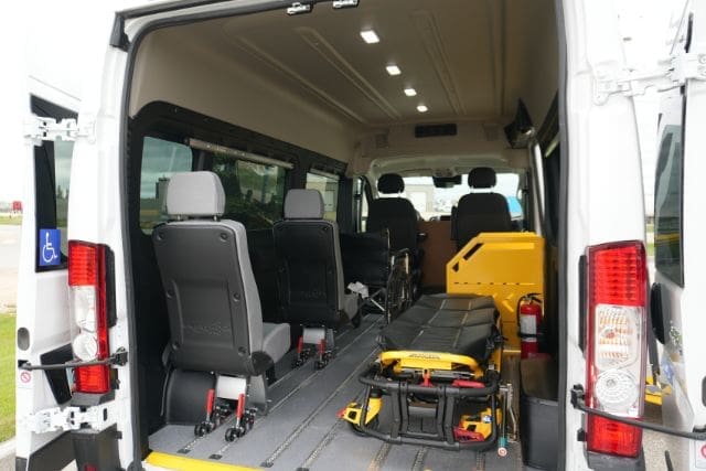 Removable seats, stretcher, and wheelchair in a P4 3-in-1 Van from MoveMobility