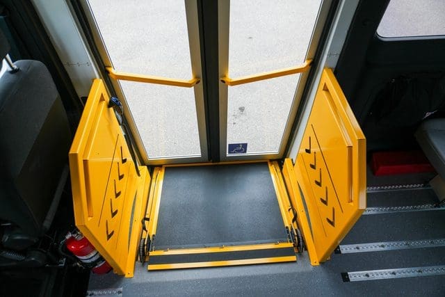 Ramp does not block opening when stowed in a side entry accessible van from MoveMobility