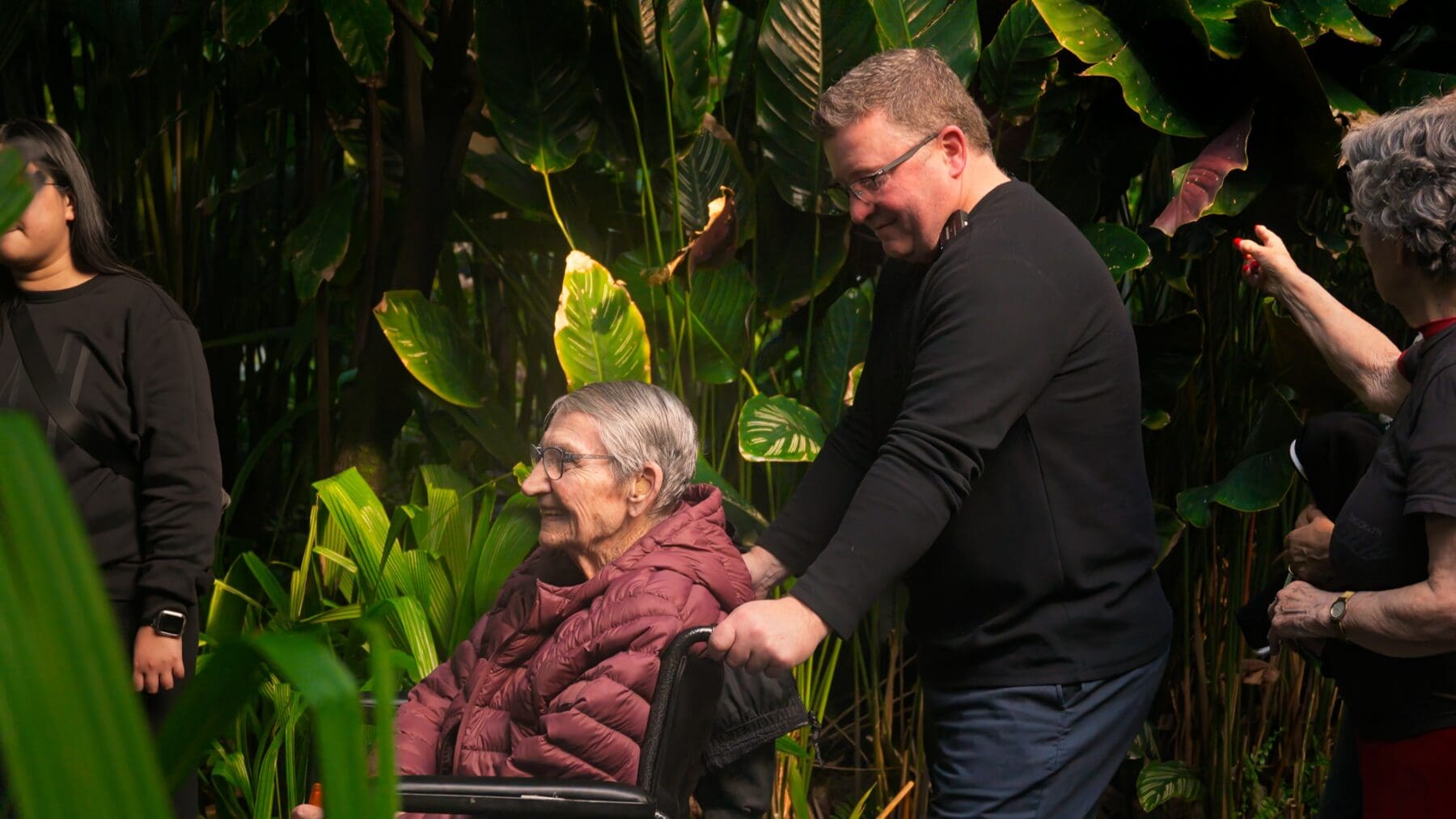 A lady in a wheelchair visiting The Leaf at Assiniboine Park