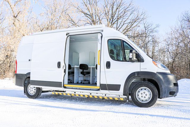 The side entrance of the Mobile Mitigation van (MM Model), used for overdose prevention, pictured outside in the winter.