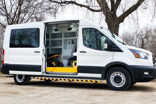 Side view of non-emergency mobile medical van used for NEMT.