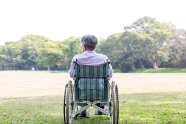 elderly man in wheelchair